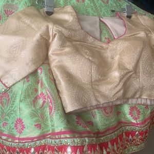 New gorgeous high quality material lengha and blouse with beautiful stitching.